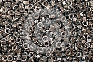 Group of lock nuts with serrated flanges made of iron.