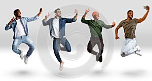 Group Of Males Taking Selfie On Smartphone While Jumping Over White Background