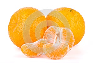 Group of mandarin tangerine with slices isolated on white background