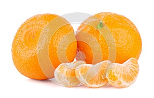 Group of mandarin tangerine with slices isolated on white background