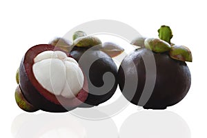 Group mangosteens.Two whole mangosteen fruit and a half