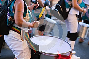 group of marchers at the gay pride march drumming in sync. It's a day of celebration, equality and gay and human rights