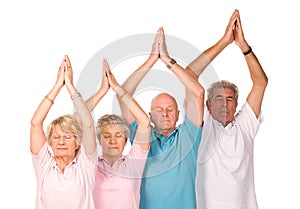 Group of mature people doing yoga