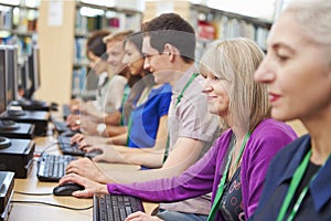 Group Of Mature Students Working At Computers