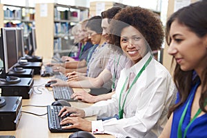 Group Of Mature Students Working At Computers