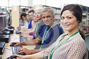 Group Of Mature Students Working At Computers