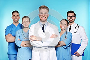 Group of medical doctors on color background