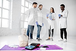 Group of medics during the first aid training indoors