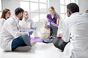 Group of medics during the first aid training indoors