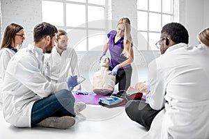 Group of medics during the first aid training indoors