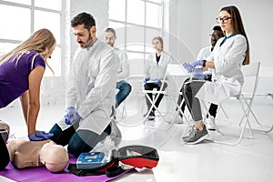 Group of medics during the first aid training indoors