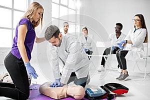 Group of medics during the first aid training indoors