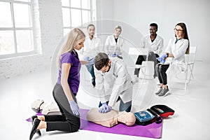 Group of medics during the first aid training indoors