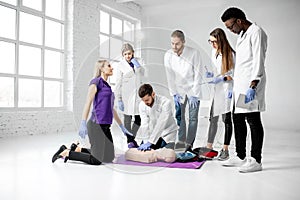 Group of medics during the first aid training indoors