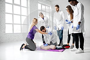 Group of medics during the first aid training indoors