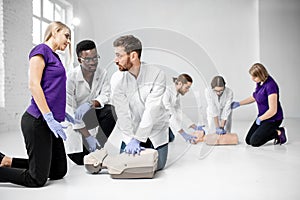 Group of medics during the first aid training indoors