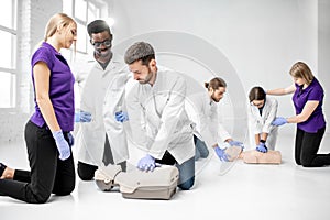 Group of medics during the first aid training indoors