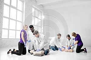 Group of medics during the first aid training indoors