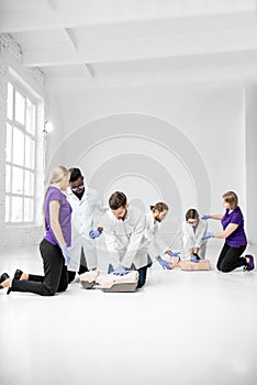 Group of medics during the first aid training indoors