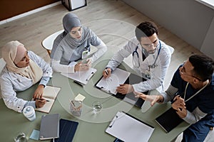 Group of Medics Talking during Seminar