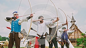 Group of medieval archers are training on archery