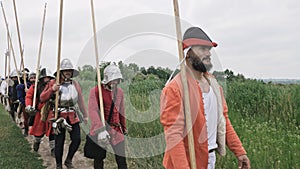 A group of medieval knights going on the battle. Military campaign of knights