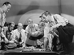 Group of men gambling