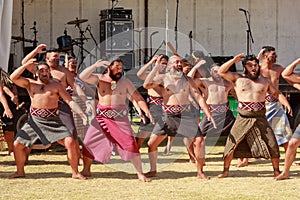 New Zealand Maori men in traditional dress performing a haka