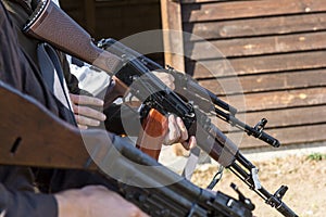 Group of men makes theirs guns ready to fire