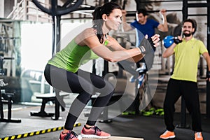 Group of men and woman in functional training gym