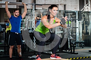 Group of men and woman in functional training gym photo