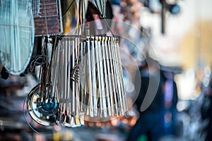 Group of metal tongs hanging in front of an old traditional store near Grand Bazaar, Istanbul.