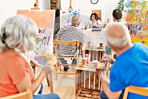 Group of middle age students having draw lesson at art studio