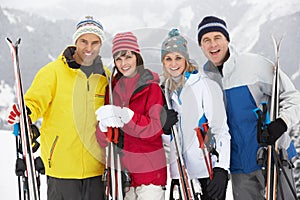 Group Of Middle Aged Couples On Ski Holiday