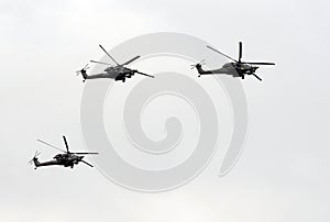 Group of the Mil Mi-28 is a Russian all-weather, day-night, military tandem, two-seat anti-armor attack helicopters in the air.