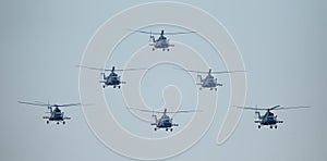 Group of military helicopters in the sky