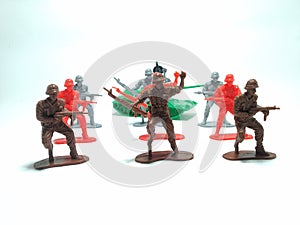 Group of miniature plastic toy soldiers and Tank