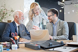 Group of mixed age business people discussing business strategy on a meeting in office