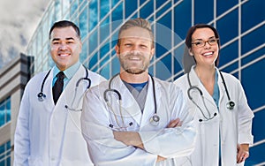 Group Of Mixed Race Male and Female Doctors or Nurses by Hospital