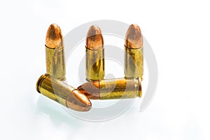 Group of 9mm bullets on white background