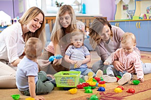 Group of mothers with babies at playgroup