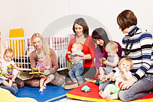 Group of mothers with their babies