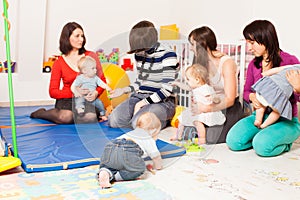 Group of mothers with their babies