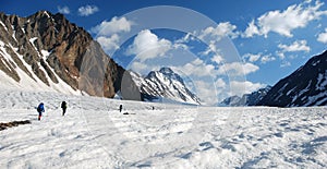 Group of mountaineers on the glacier