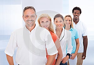 Group of multi-ethnic people standing in a row