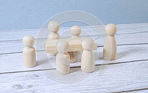 Group Of Multi-Ethnic People Working On Digital Devices Around Table