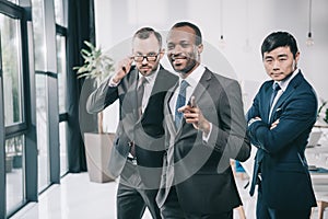 group of multiethic businessmen looking