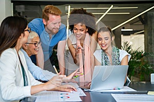 Group of multiethnic business people working together on conference and meeting in modern office