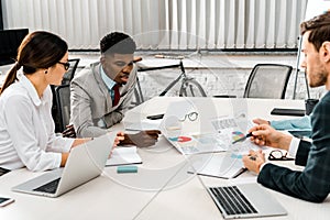 Group of multiethnic businesspeople having discussion during meeting