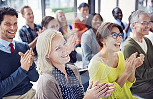 Group of Multiethnic Cheerful People Applauding photo